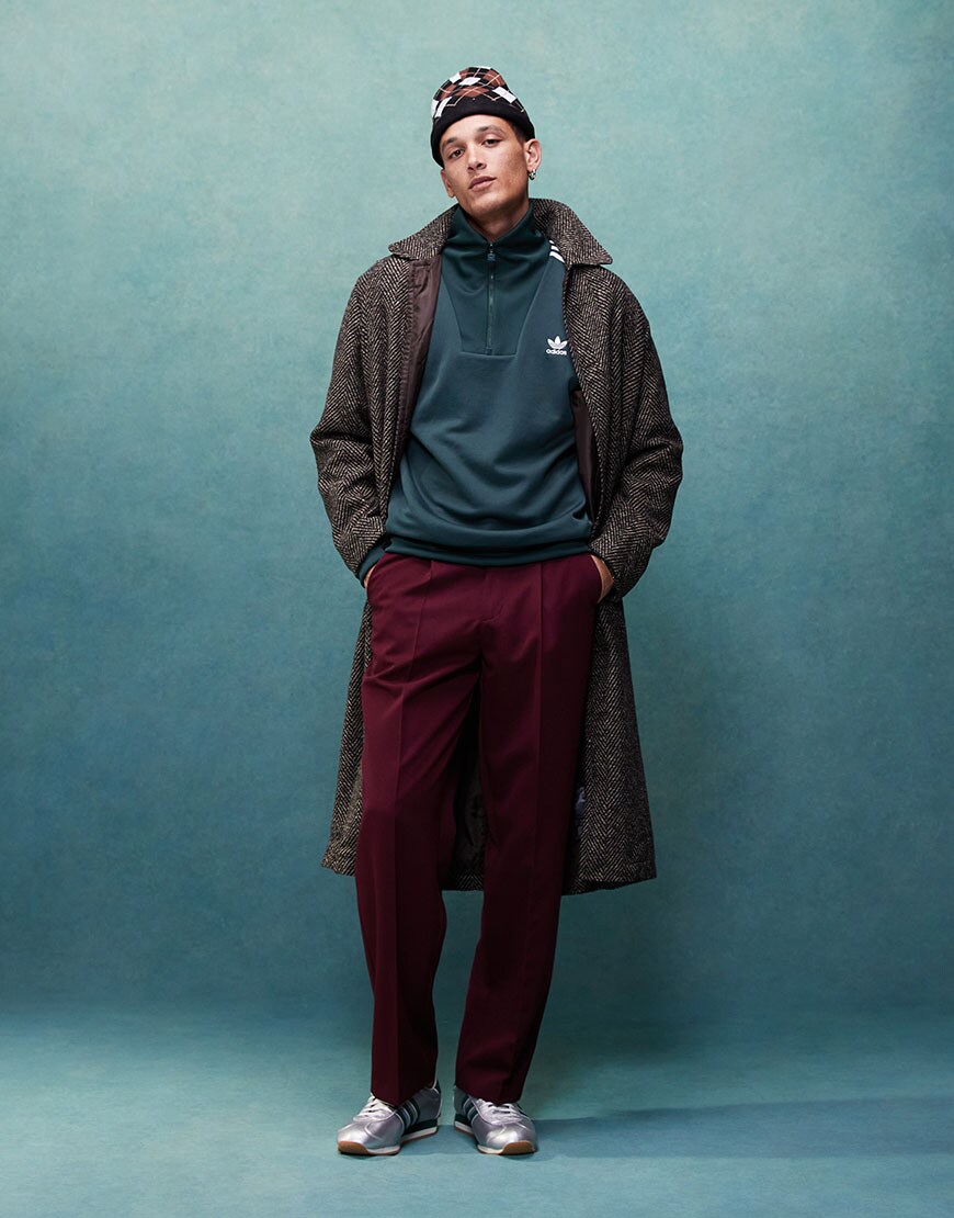 Model wearing coat, track top and tailored trousers | ASOS Style Feed