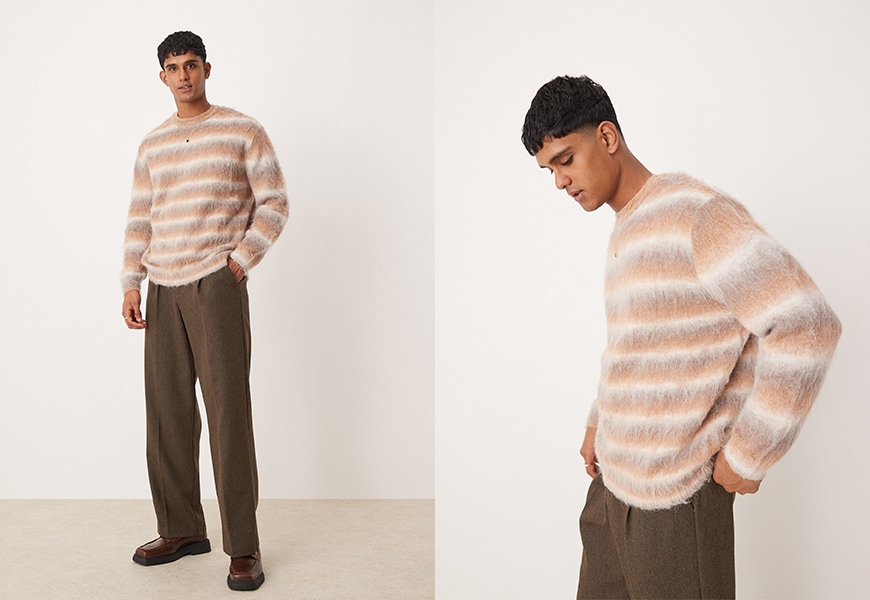 Model wearing a striped knit jumper