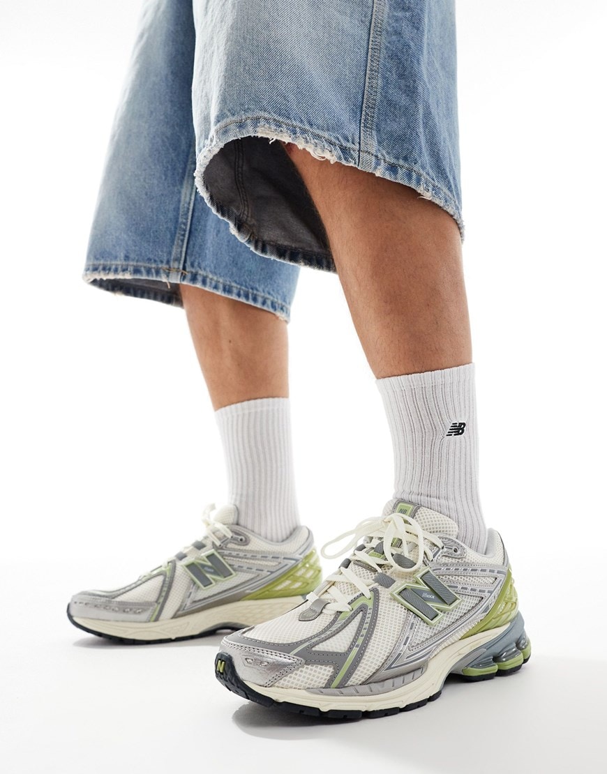 New Balance 1906 sneakers in white with silver and lime details