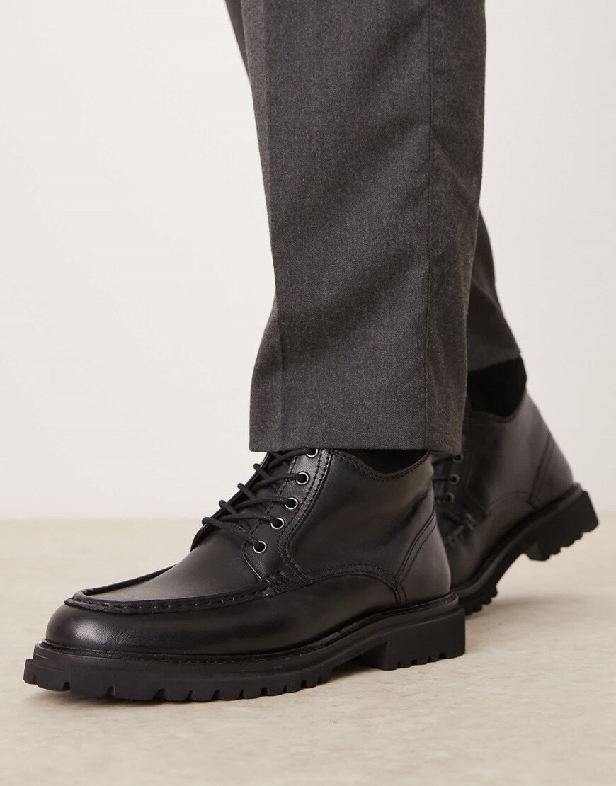 Model wearing black shoes