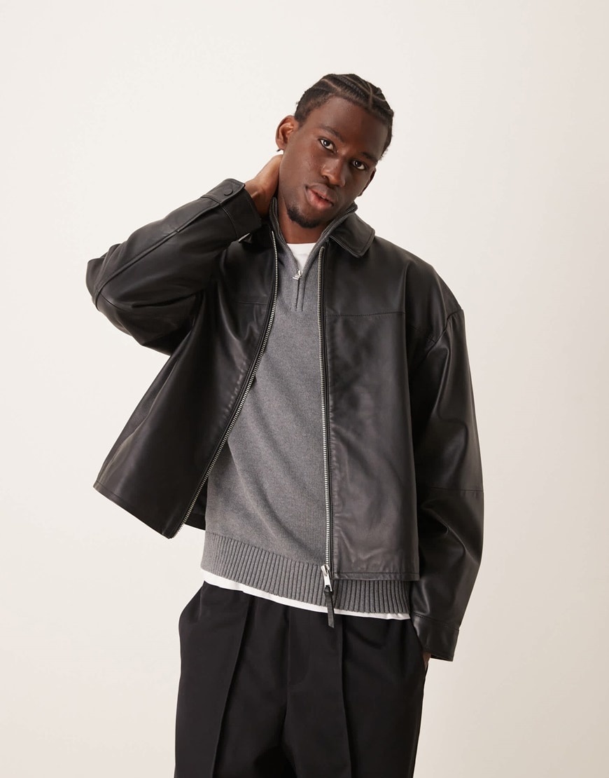 Model wearing leather black Harrington jacket