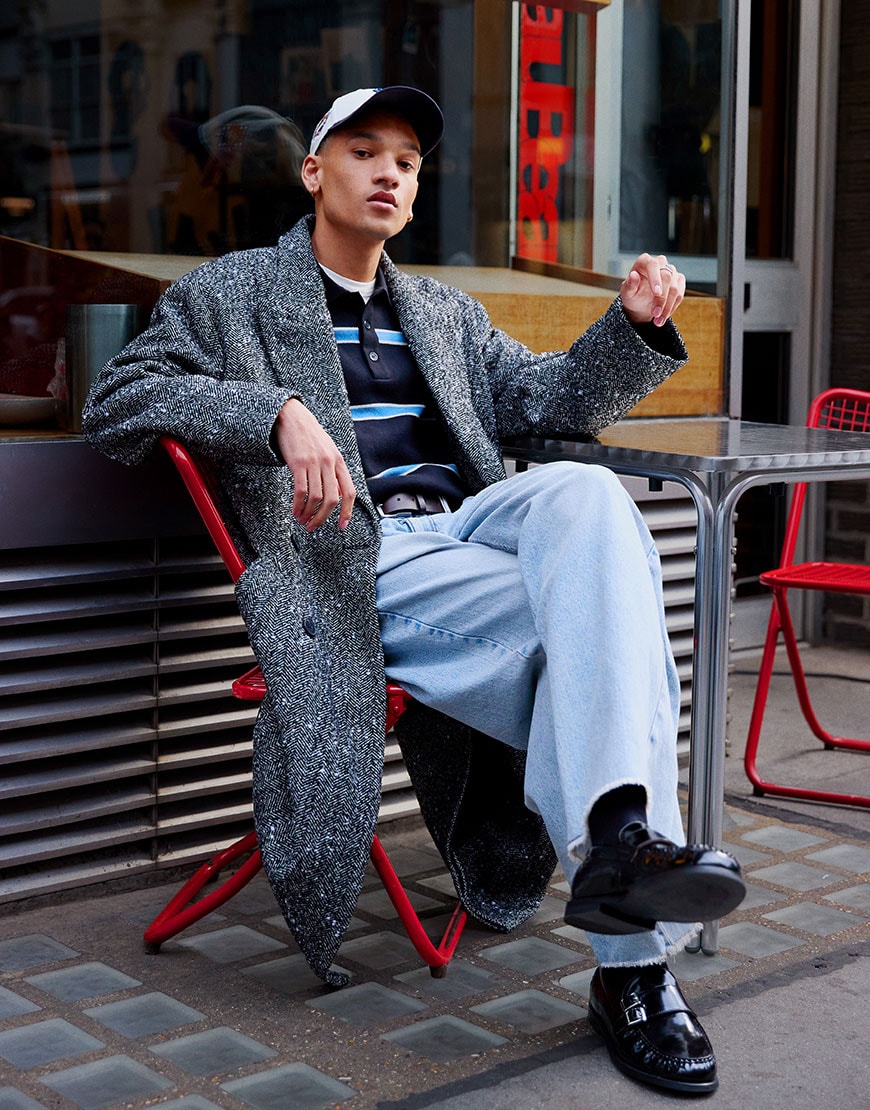 Model wearing coat, knit, jeans and loafers | ASOS Style Feed