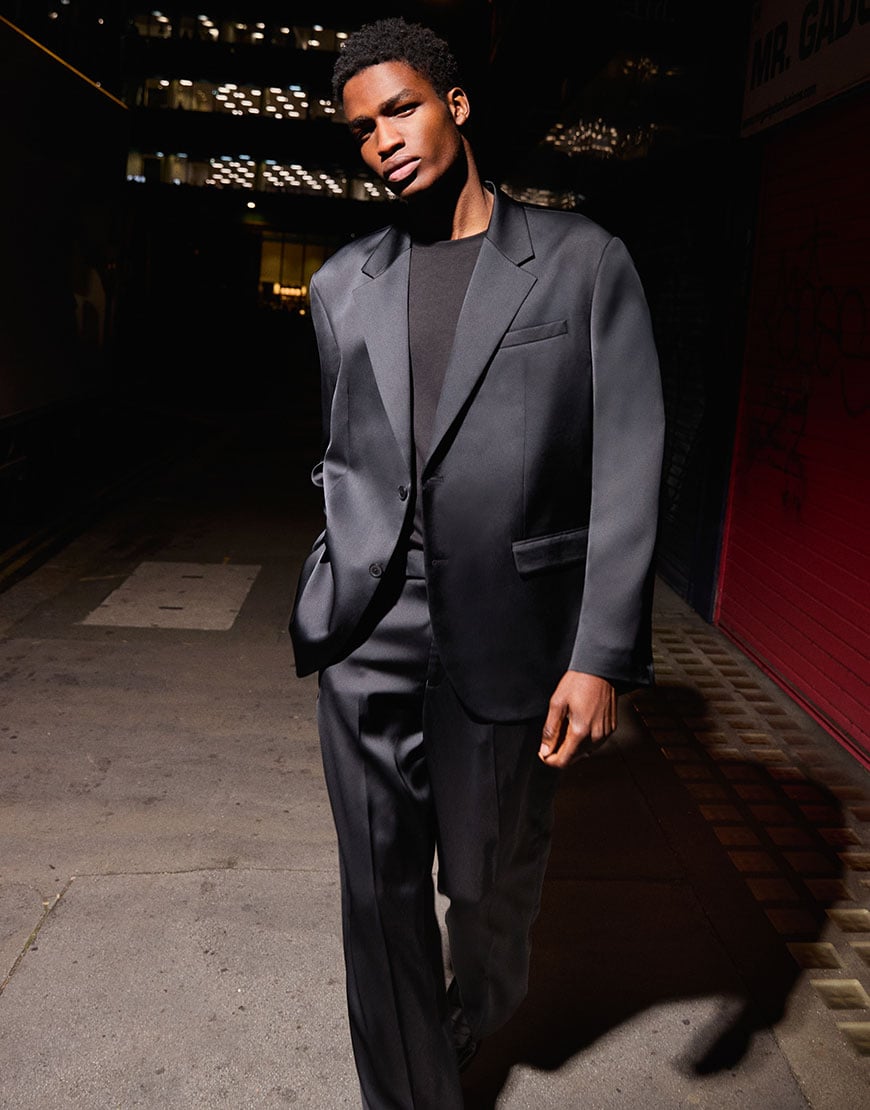 Model wearing black suit | ASOS Style Feed