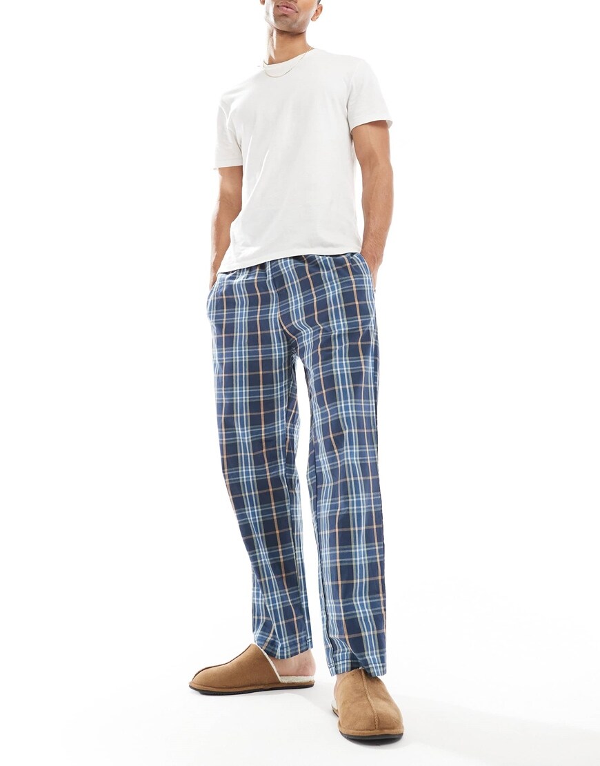Model in check blue pyjamas. | ASOS Style Feed