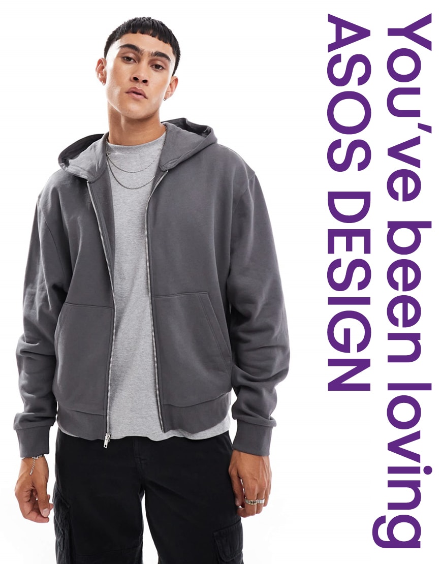 Model wearing grey tracksuit