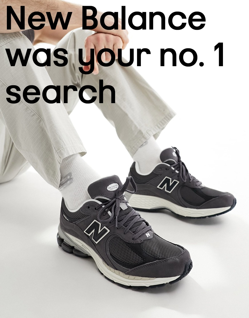 Model wearing New Balance trainers
