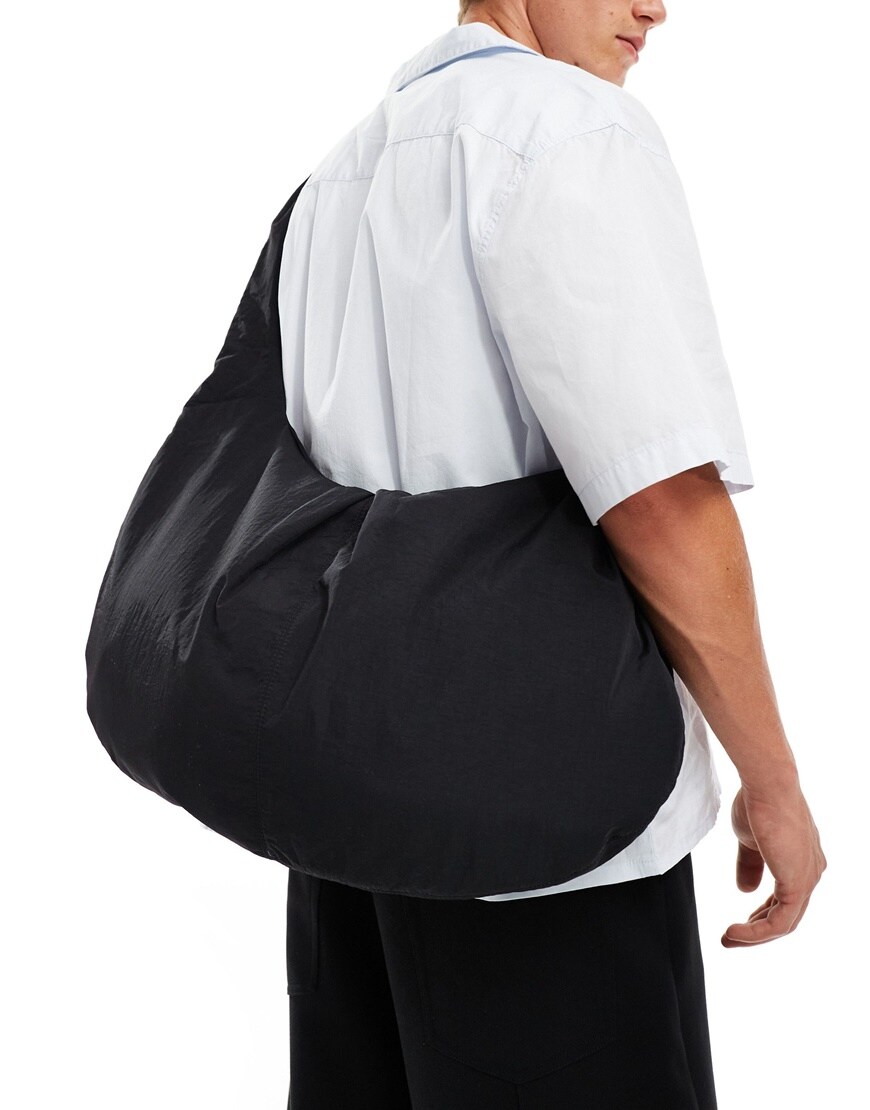 ASOS DESIGN nylon slouchy sling bag in black