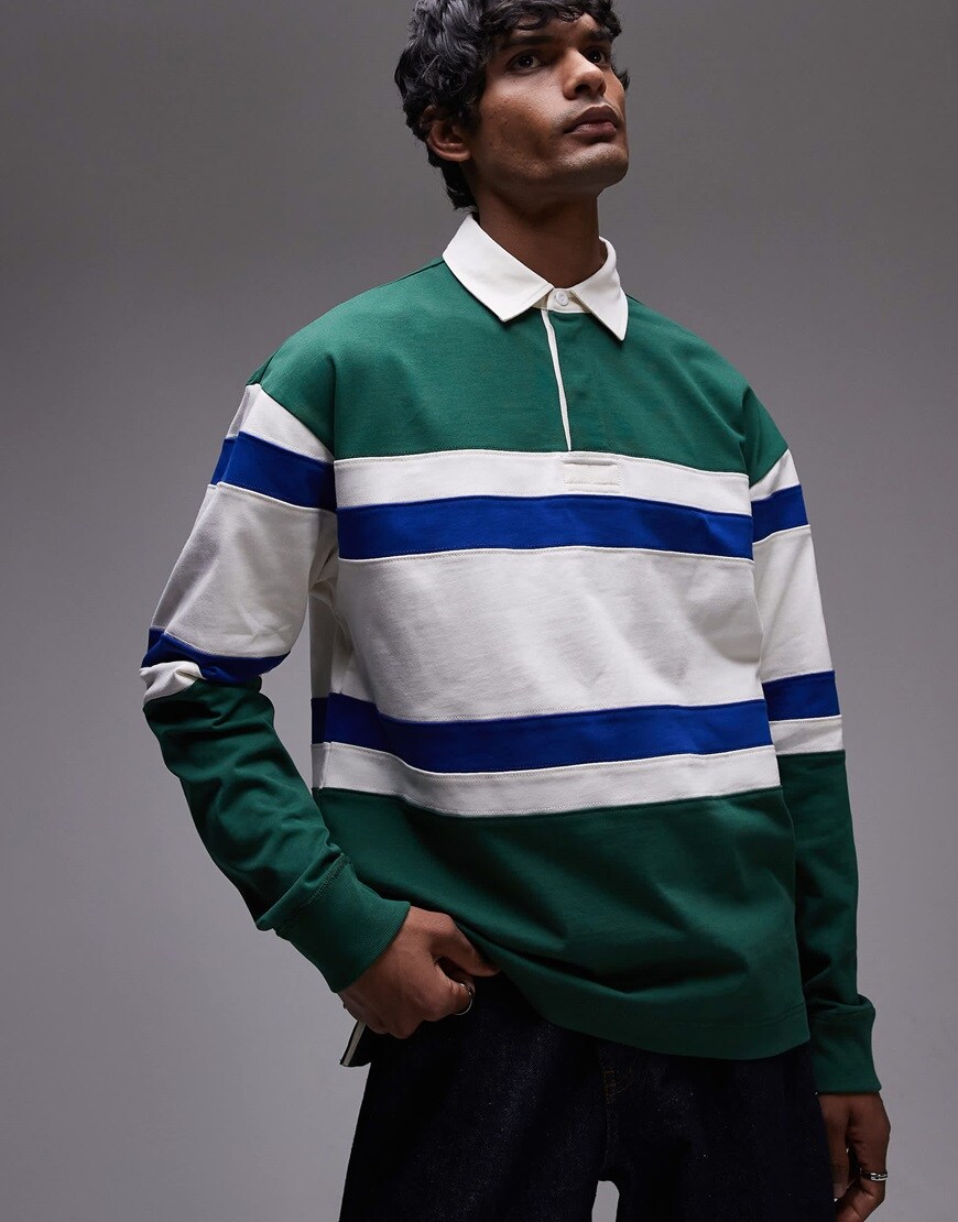 Model wearing green striped rugby shirt