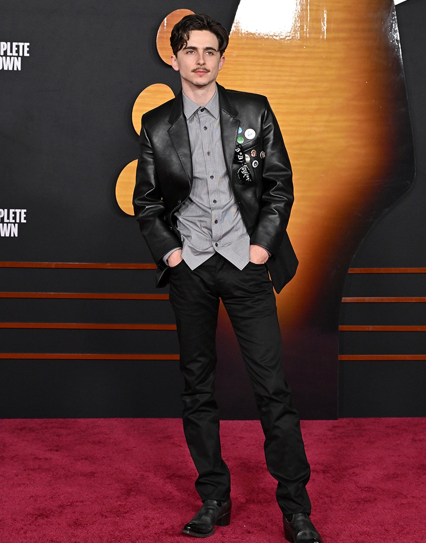 Timothée Chalamet wearing a black leather jacket