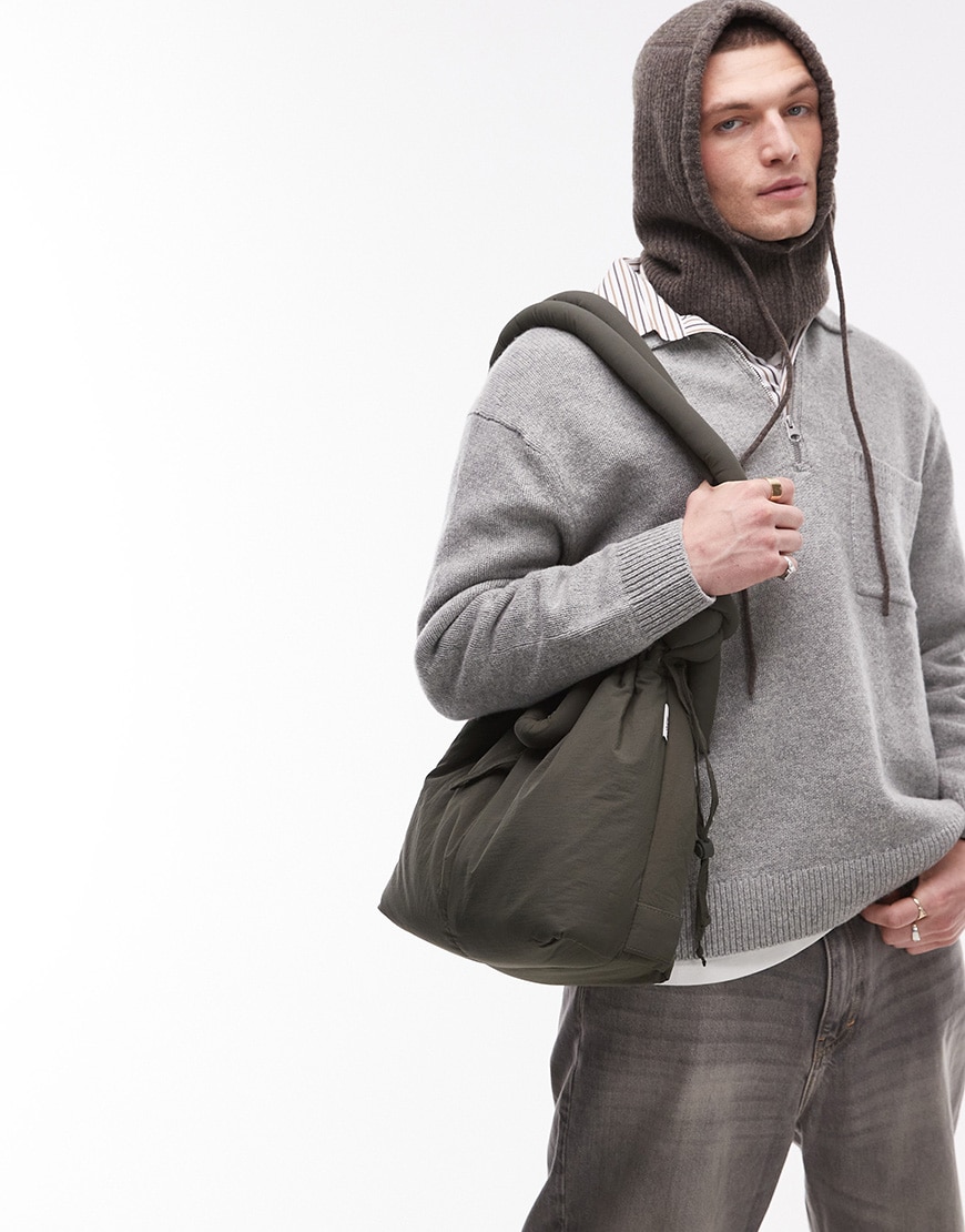 A model wearing a khaki Ölend bag | ASOS Style Feed