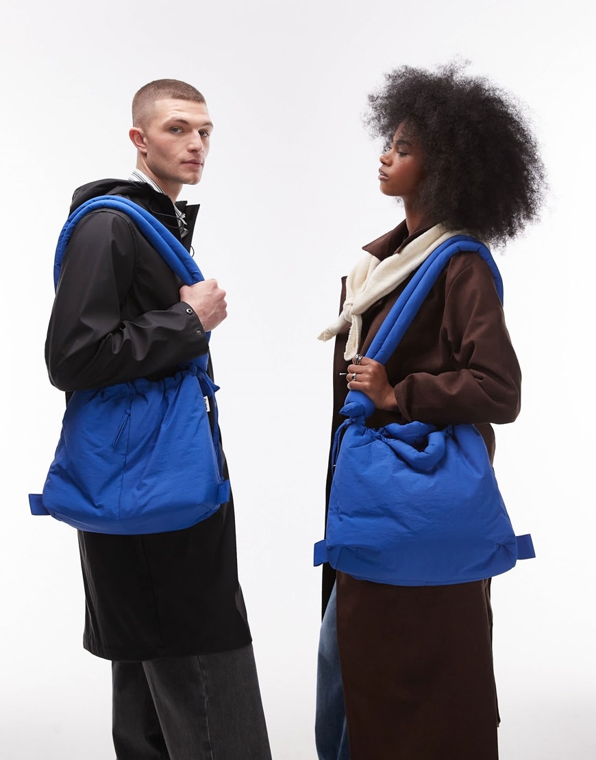 Two models holding a blue Ölend bag | ASOS Style Feed
