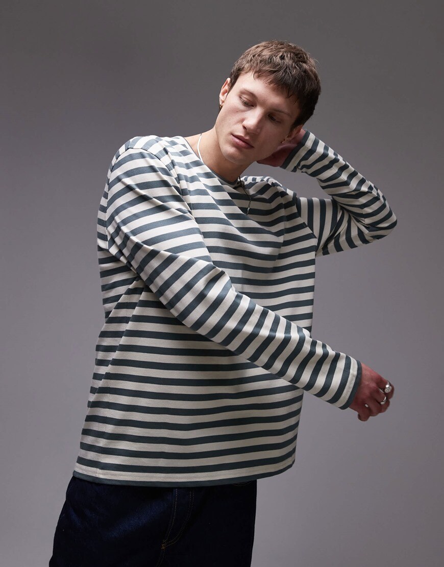 Man wearing a striped long sleeve top
