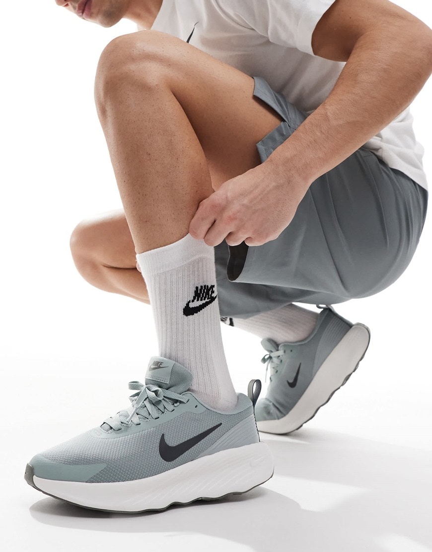 Nike Training Legend Essential 4 sneakers in gray and white