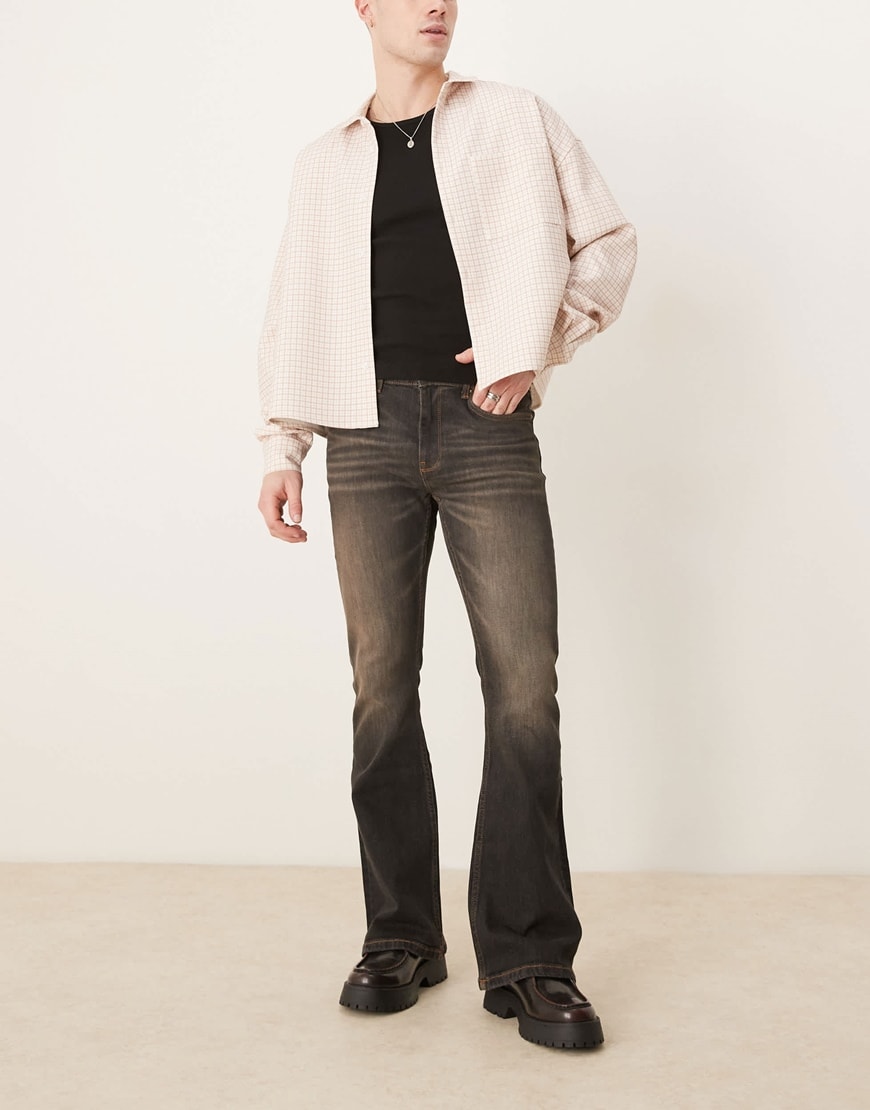 ASOS DESIGN stretch flare jeans with brown tint in washed black | ASOS Style Feed