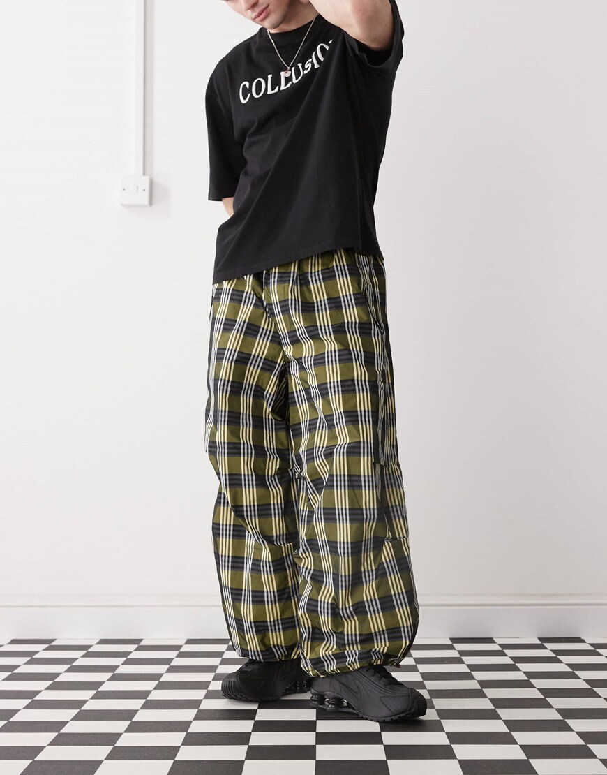 A model wearing checked trousers
