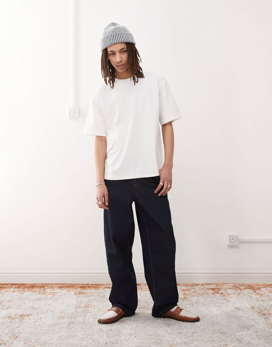 A model wearing black jeans 