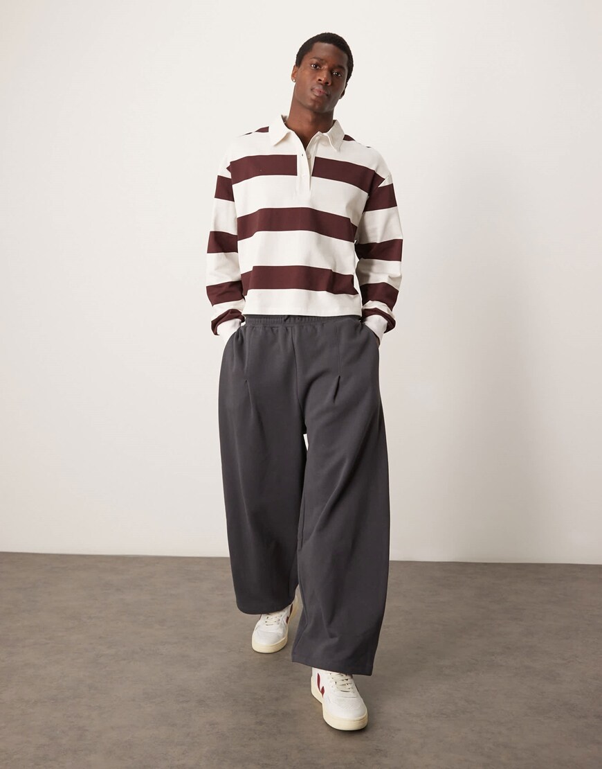 A model wearing grey jersey shorts