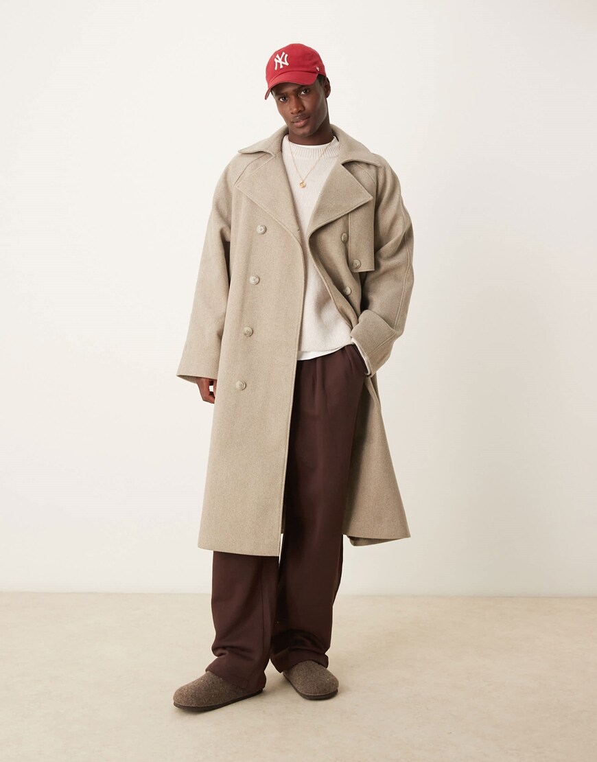 Model wearing a beige overcoat