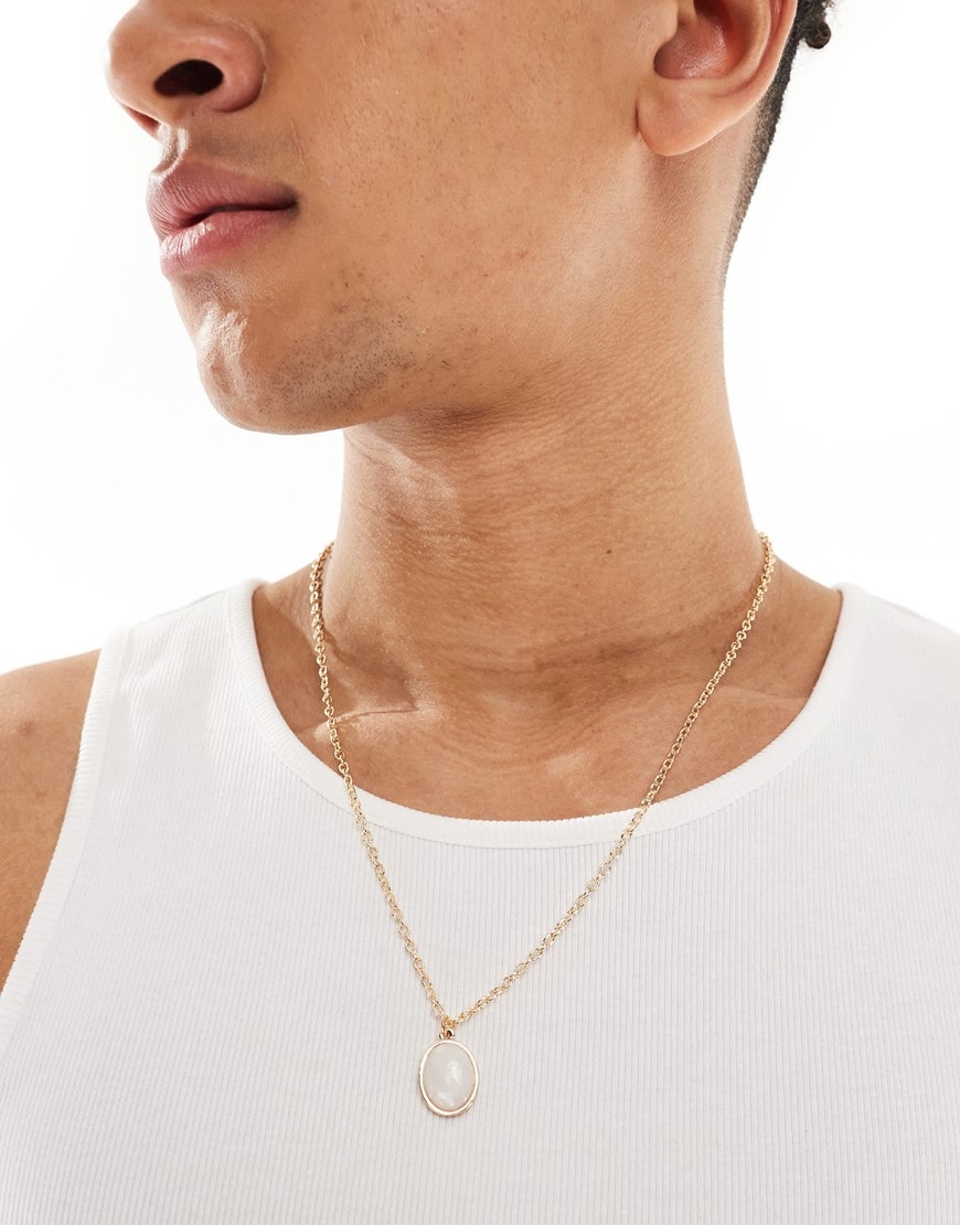 ASOS DESIGN oversized oval faux mother of pearl pendant necklace in gold tone | ASOS Style Feed