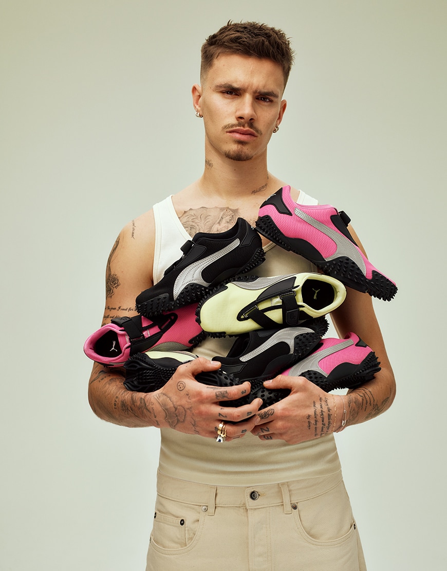 Romeo Beckham holding PUMA Mostro | ASOS Style Feed