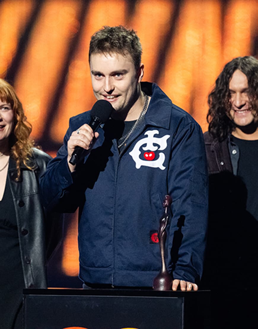 Sam Fender wearing ICE CREAM navy jacket at the BRITs | ASOS Style Feed