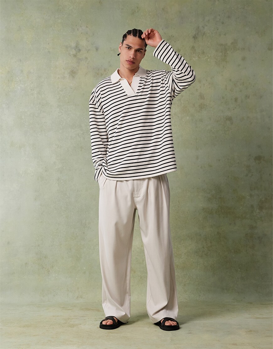 Model wearing oversized striped t-shirt