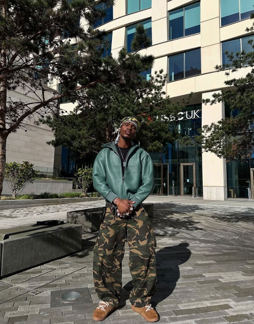 Man wearing camo trousers and leather jacket | ASOS Style Feed