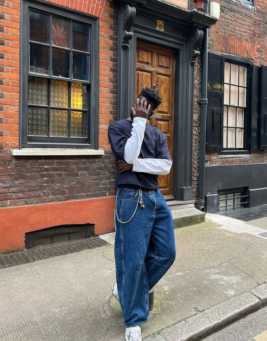 Man wearing baggy denim jeans and blue t shirt | ASOS Style Feed
