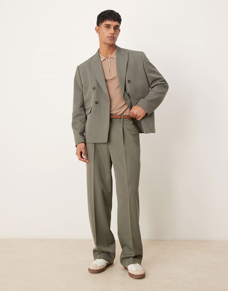 Model wearing a khaki oversized boxy suit