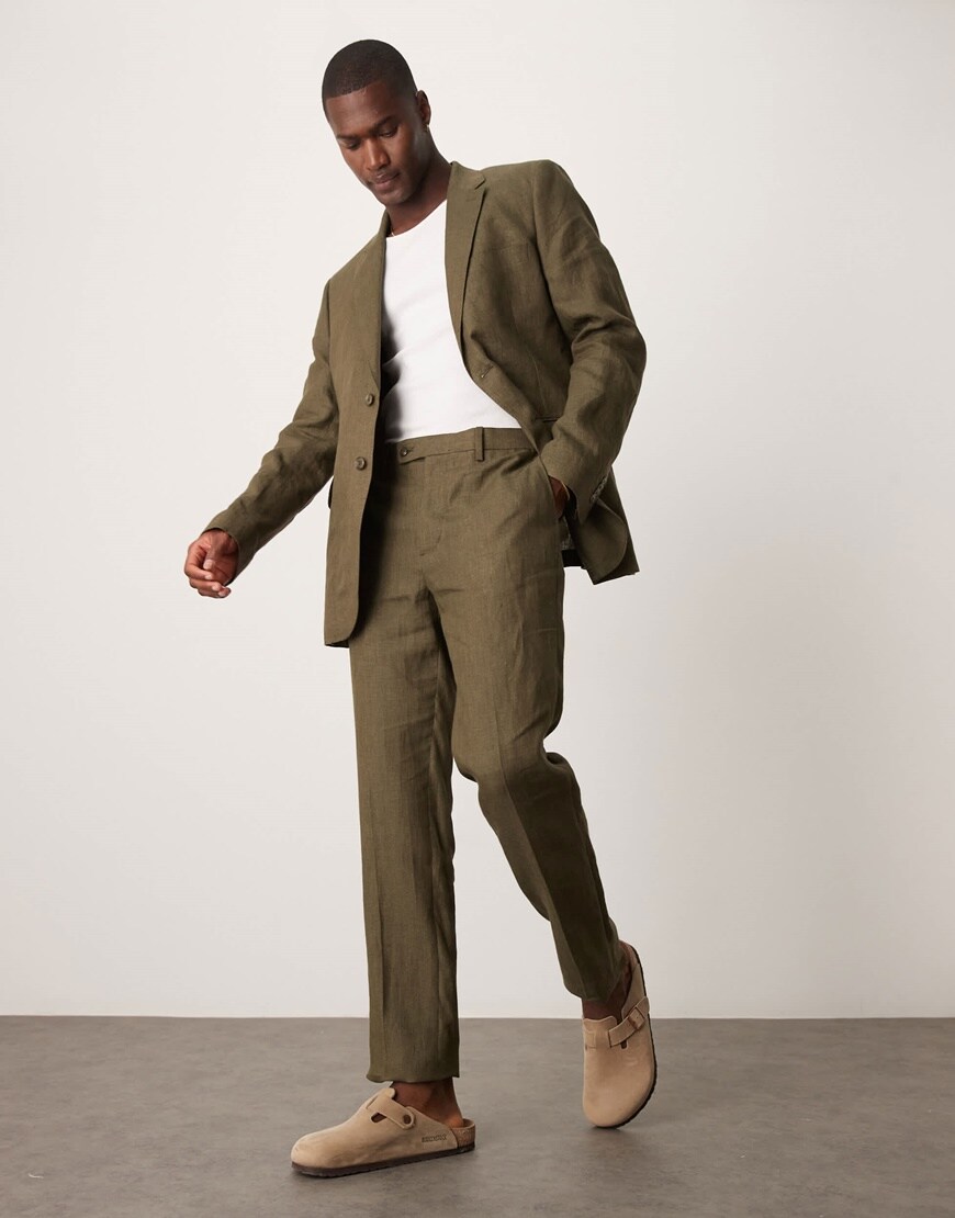 Model wearing a khaki oversized suit