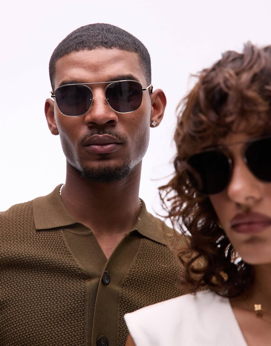 Male model wearing aviator sunglasses