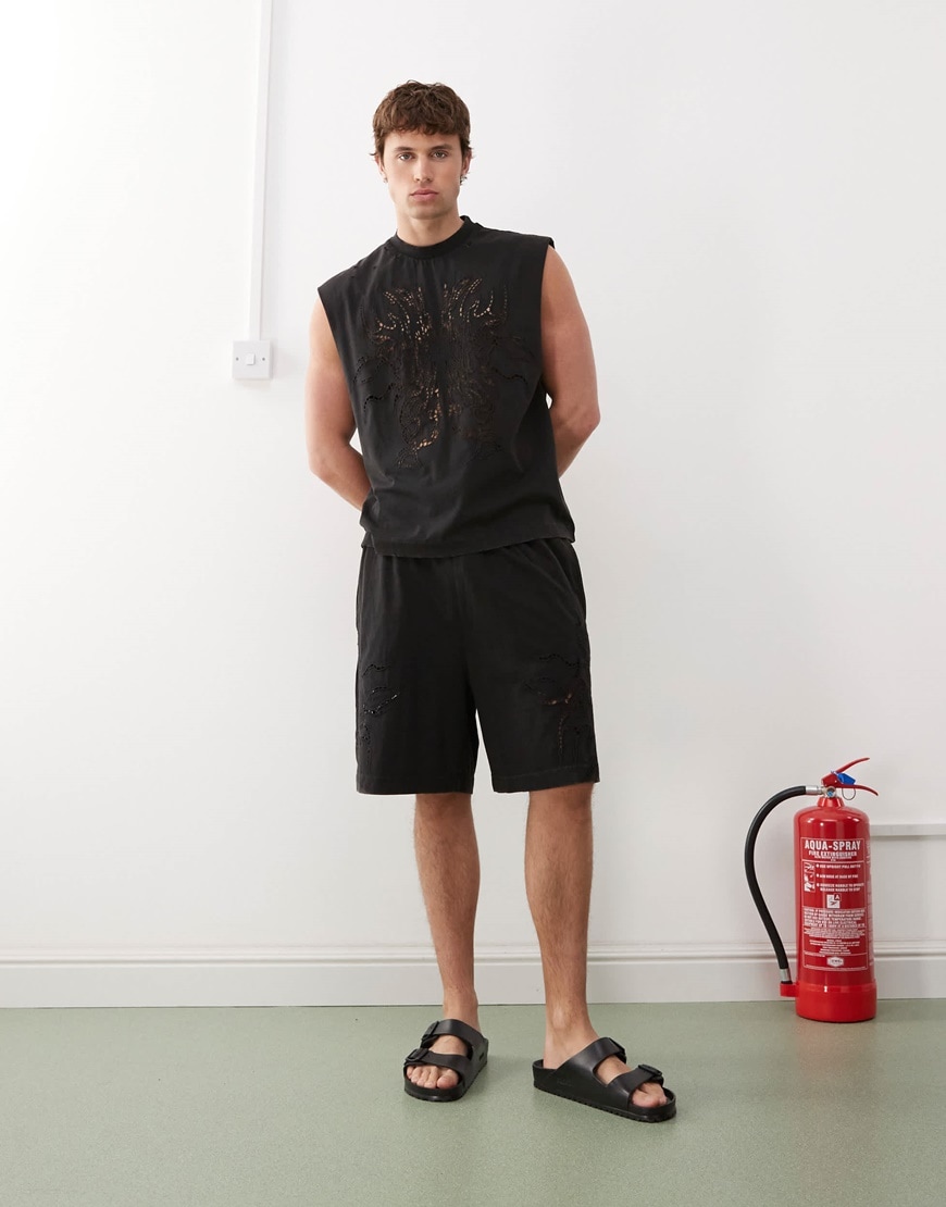 A model wearing a black co-ord