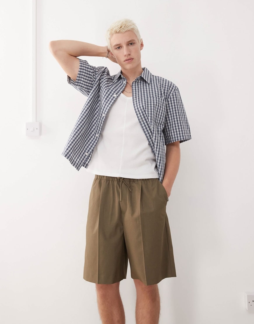 A model wearing khaki shorts