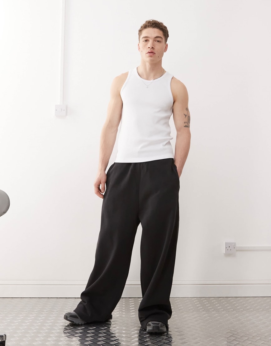 A model wearing black oversized joggers