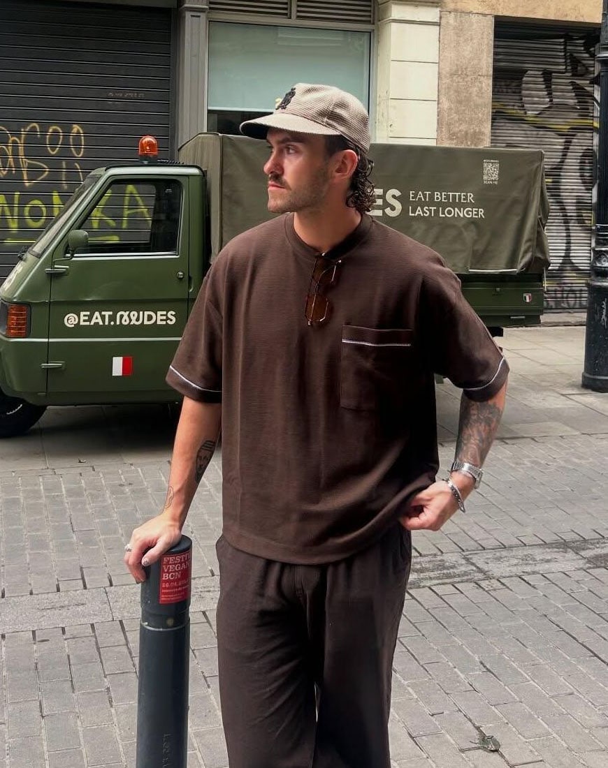 Man wearing brown t shirt and linen trousers | ASOS Style Feed