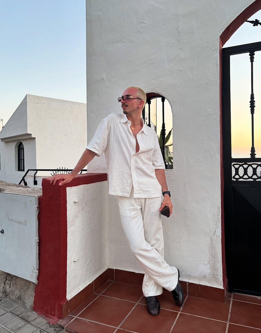Man wearing a white linen co-ord set