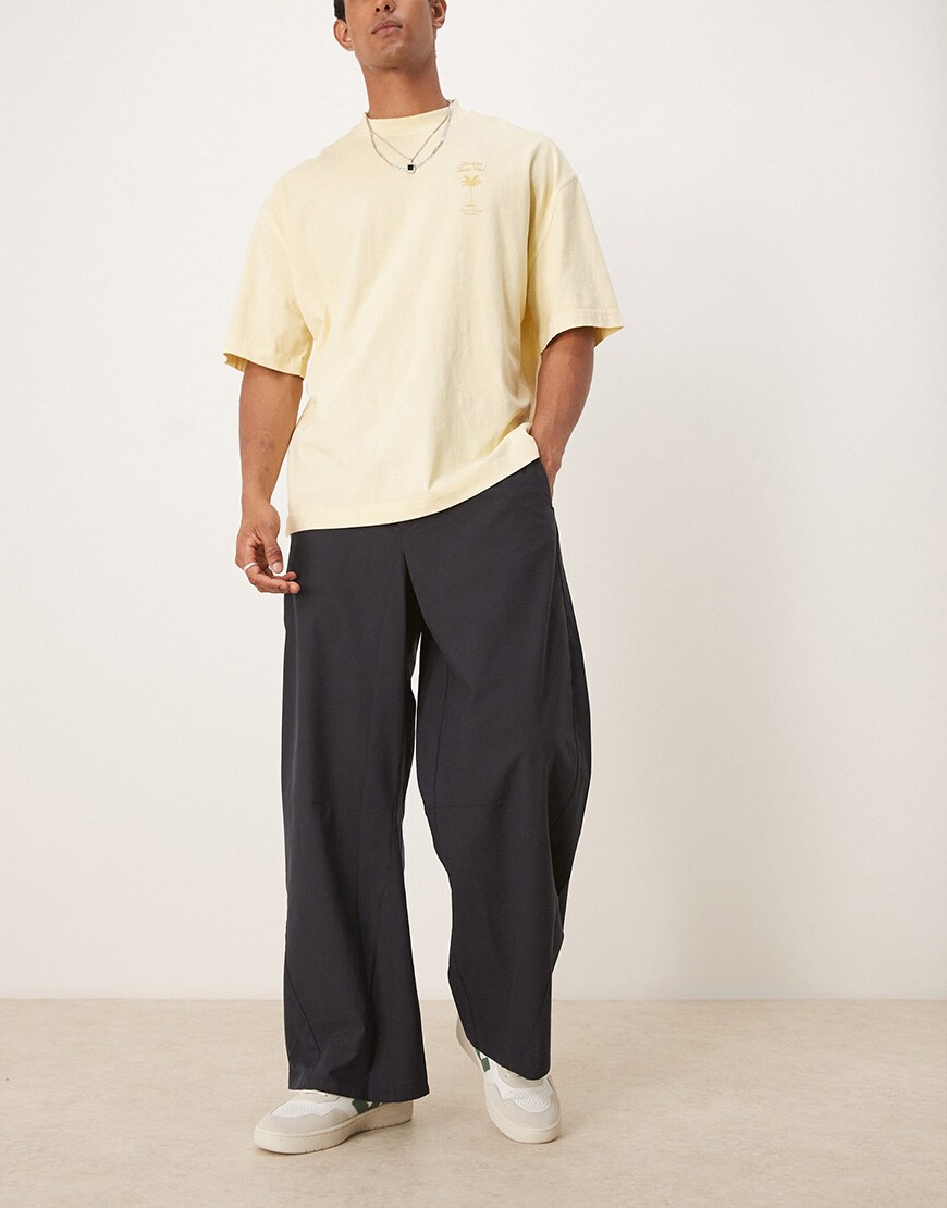 A model wearing black trousers