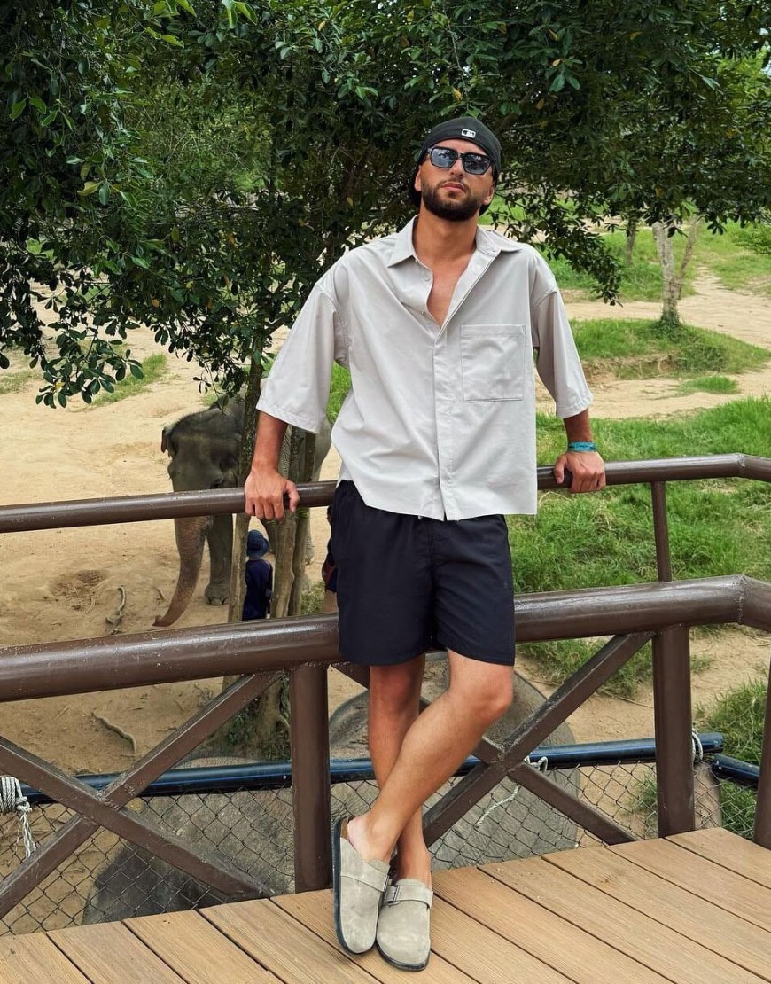 @sylablin wearing a new era NY cap