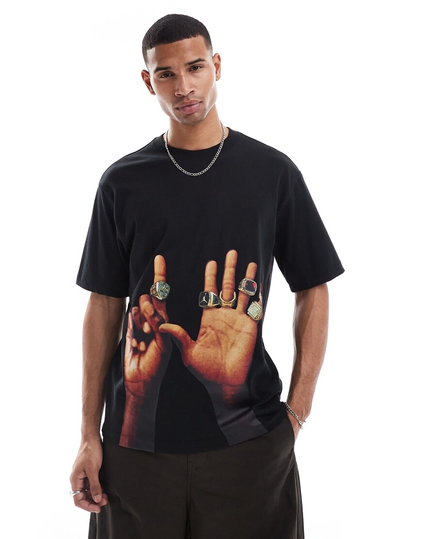 A model wearing a Jordan printed T-shirt