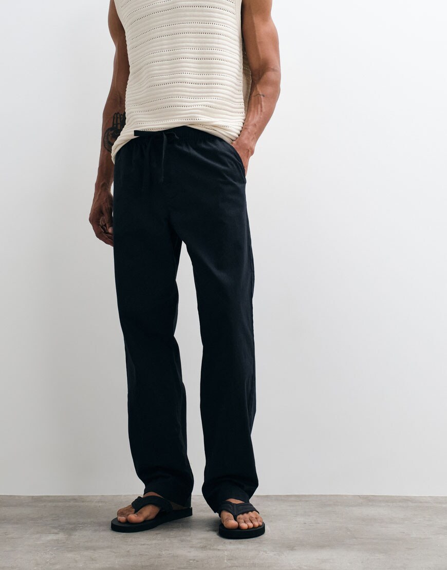 model wearing black trousers|ASOS Style Feed