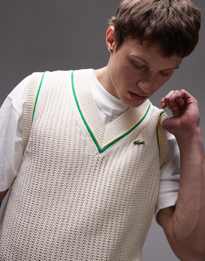A model wearing a Lacoste knitted vest