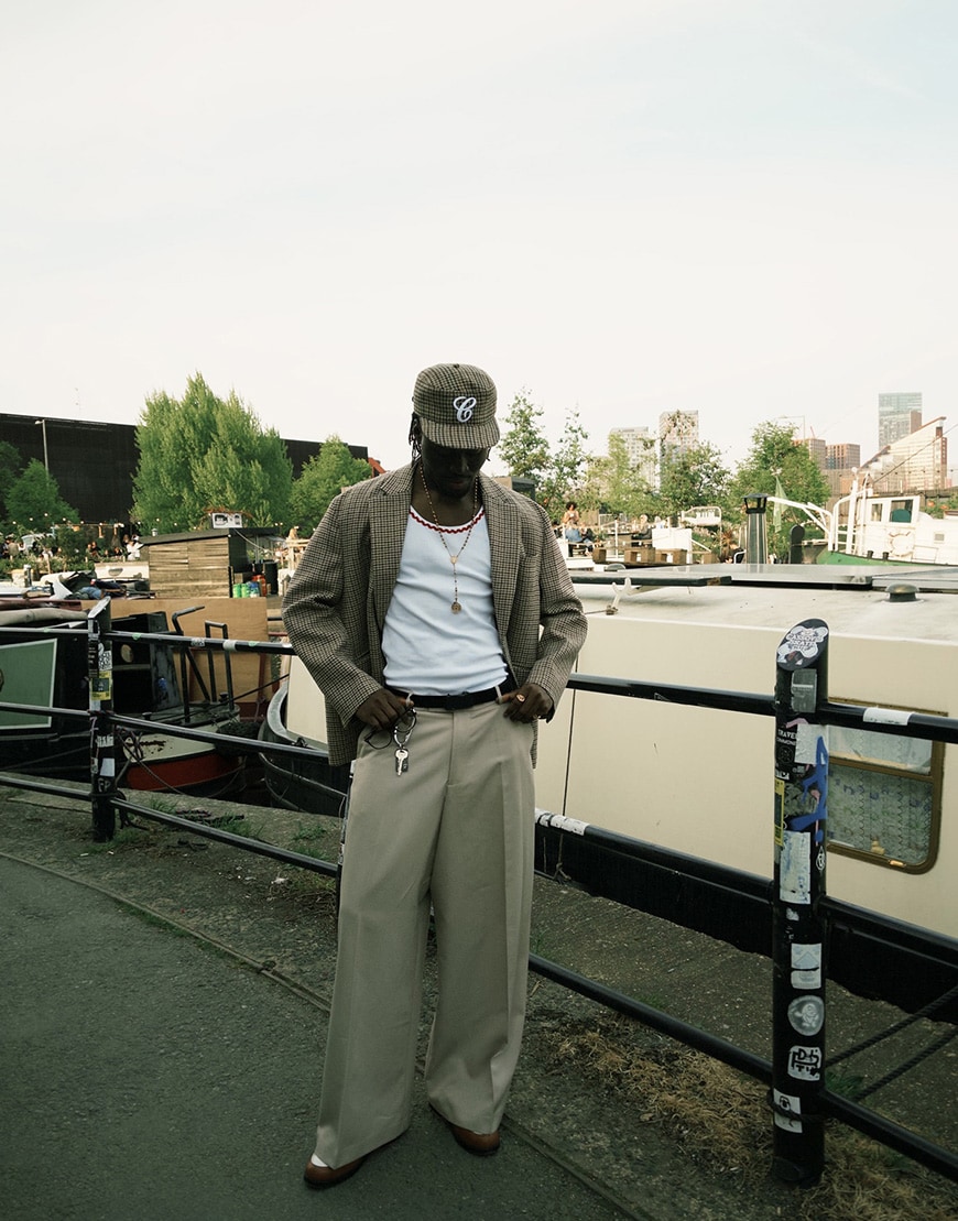 An ASOSer wearing a blazer and trousers with a tank