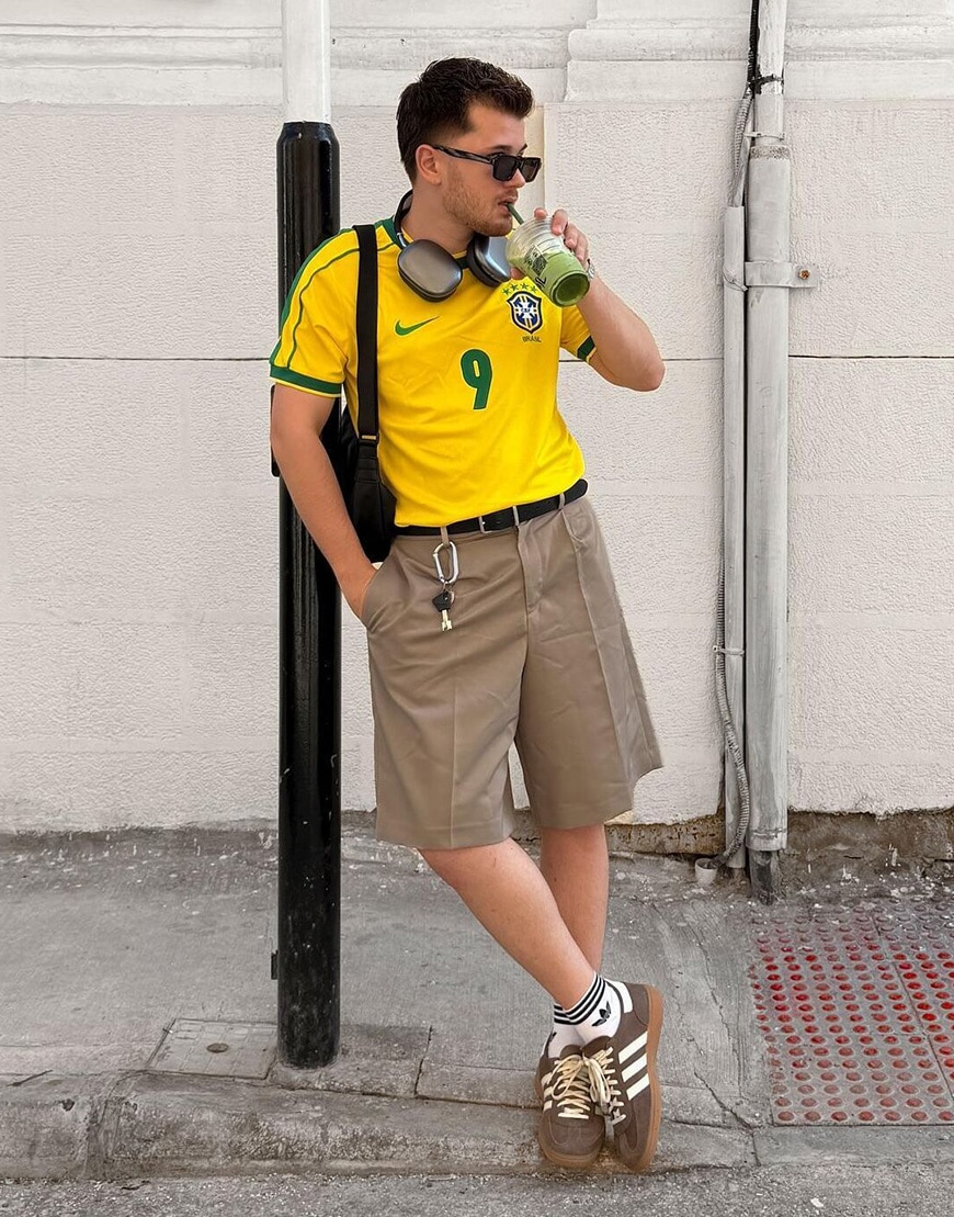 Man wearing yellow football shirt and cargo shorts | ASOS Style Feed