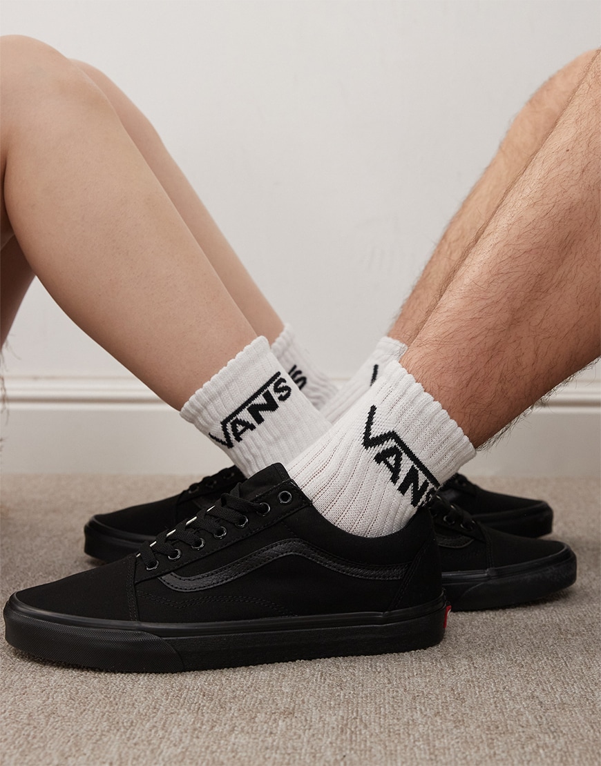 All-black Vans Old Skool trainers