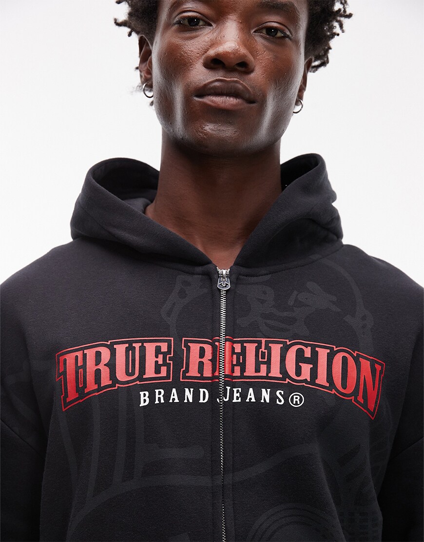 Model wearing a True Religion hoodie