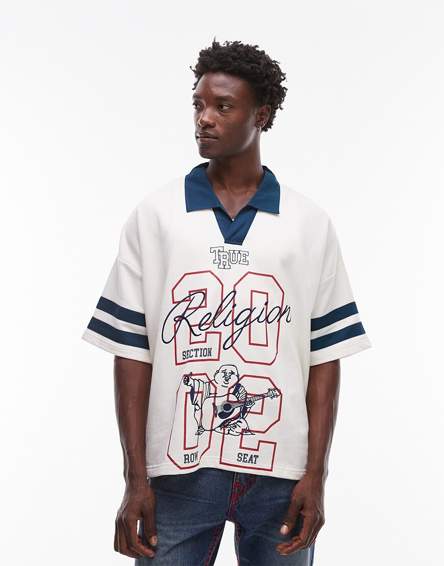 Model wearing a True Religion rugby polo shirt