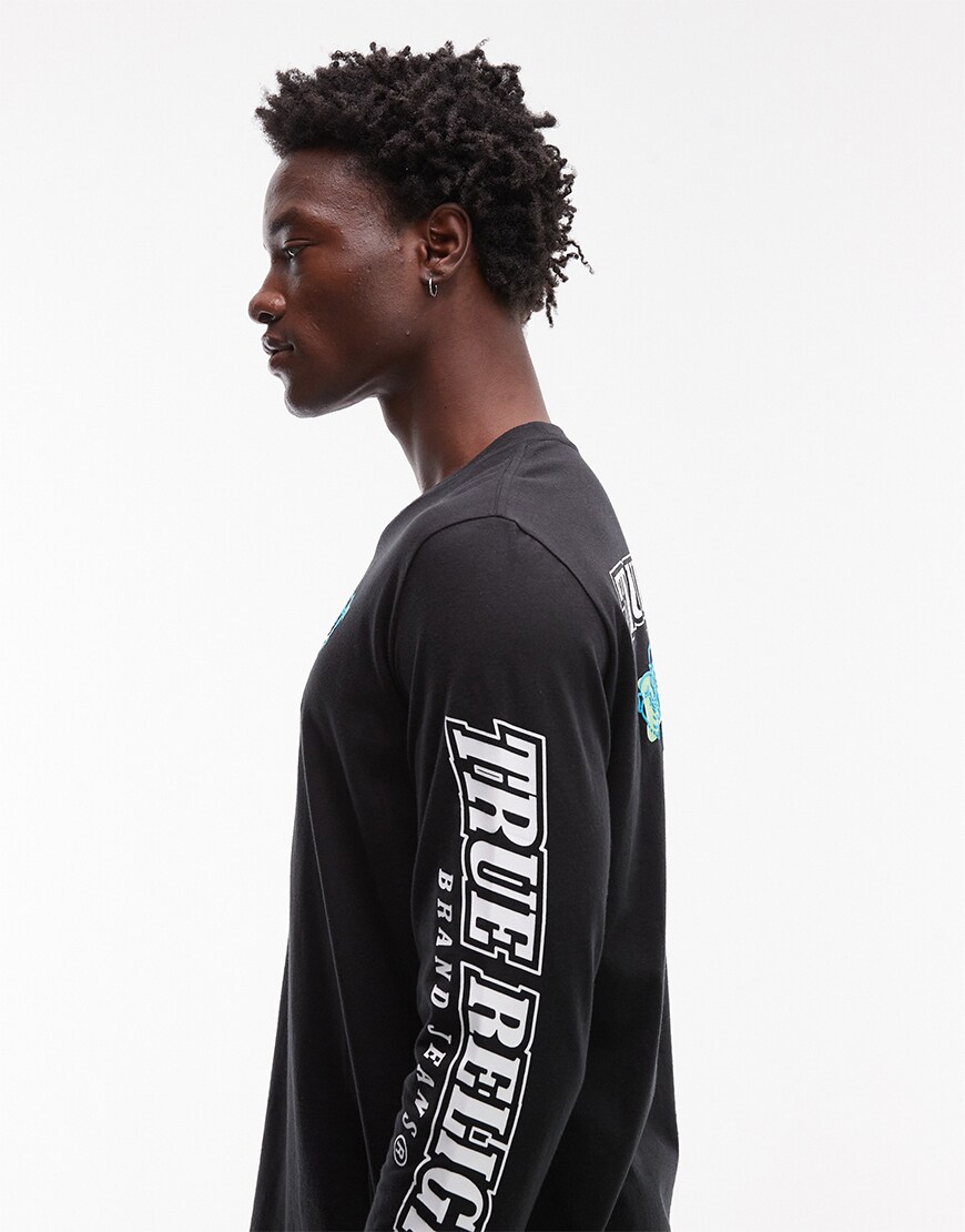 Model wearing a True Religion t-shirt