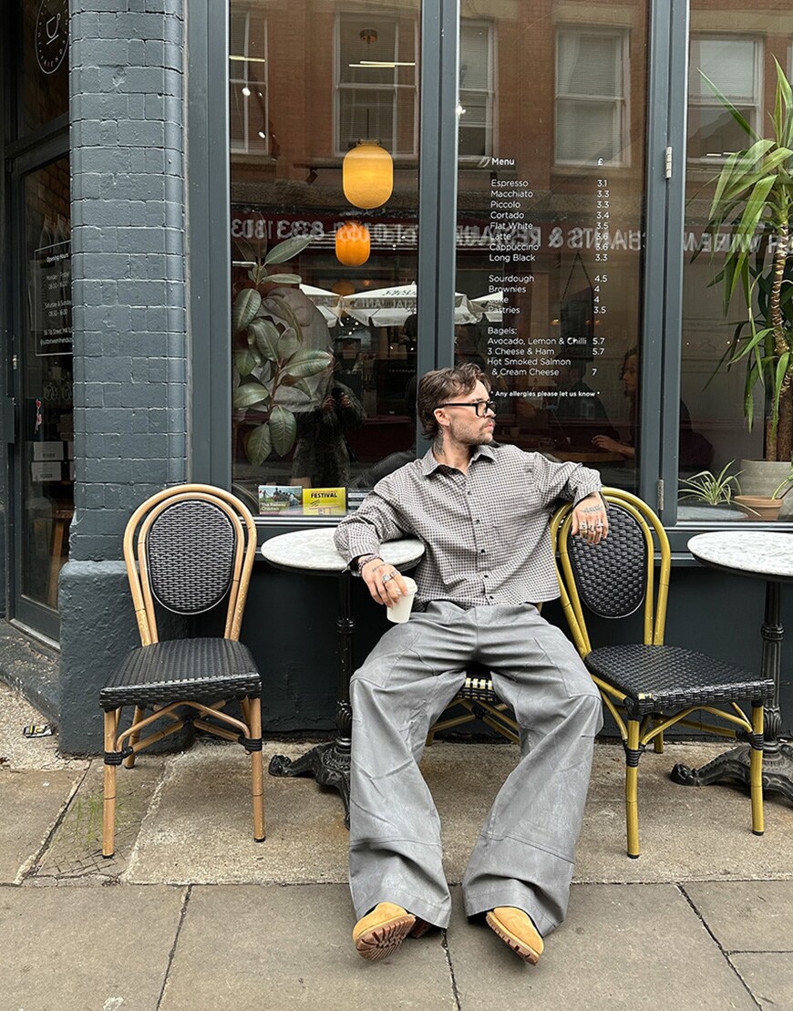 Man wearing checkered shirt and grey jeans | ASOS Style Feed