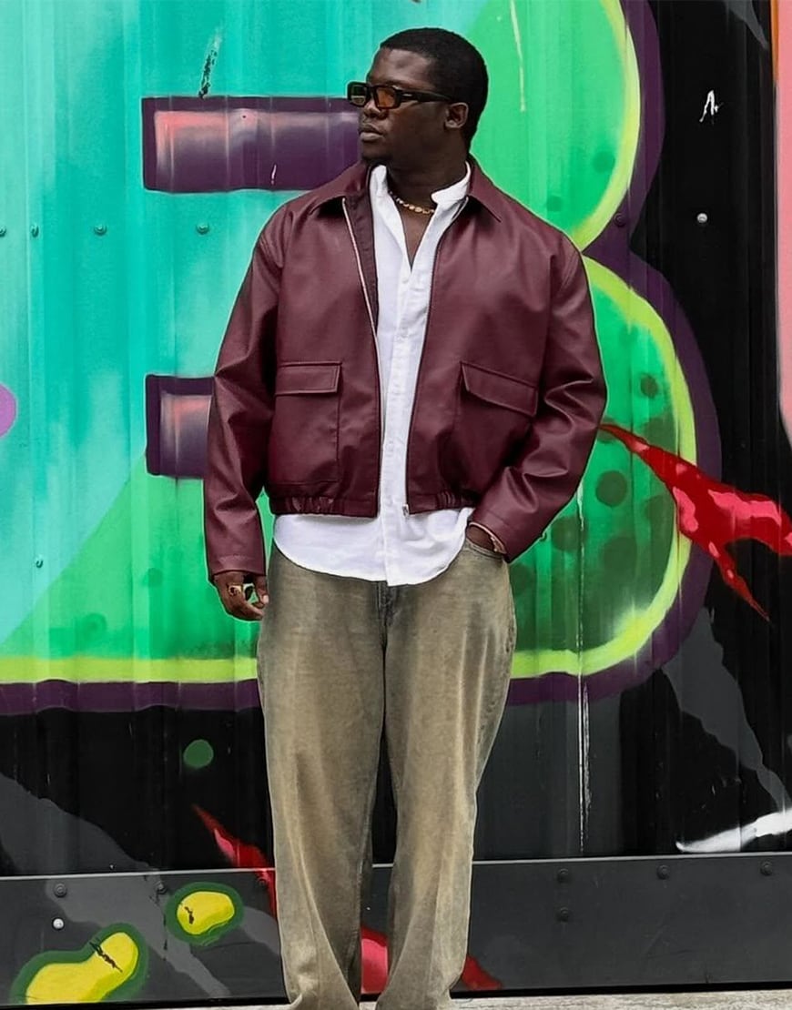 Man wearing a red leather-look jacket