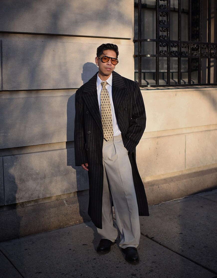 Man wearing a striped jacket